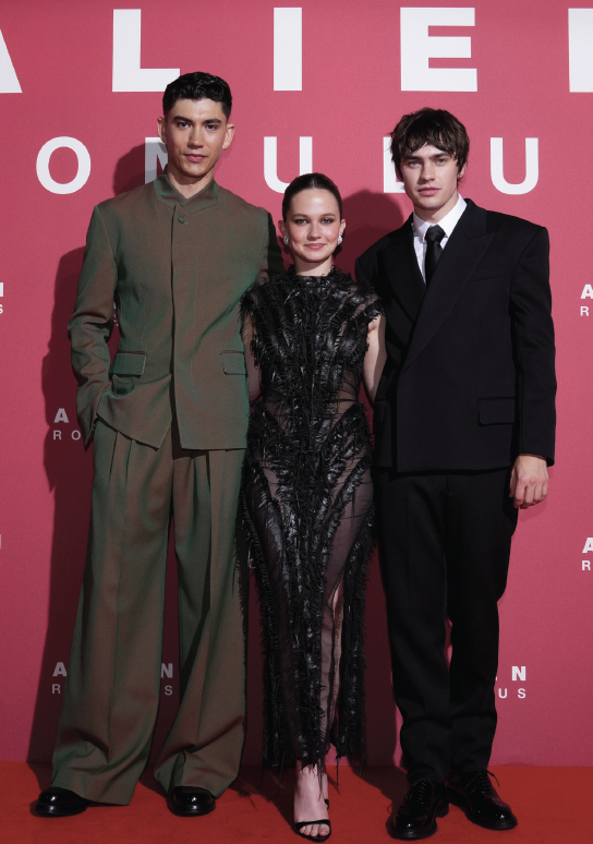 Cast members, from left, Aileen Wu, Isabela Merced and Archie Renaux arrive at the premiere of “Alien: Romulus”